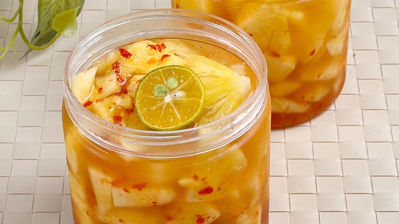 two jars of pickled pineapple