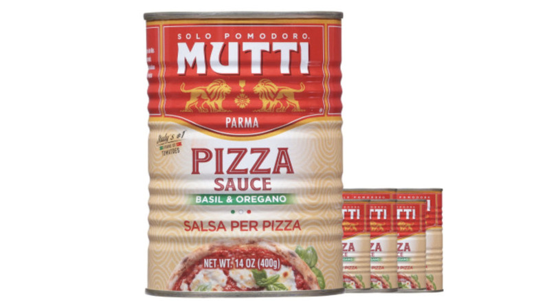 cans of Mutti pizza sauce