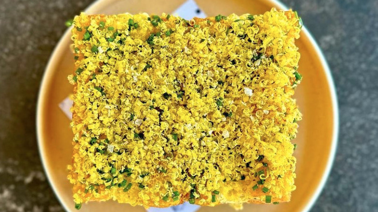 Bird's eye view of egg salad sandwich with topping