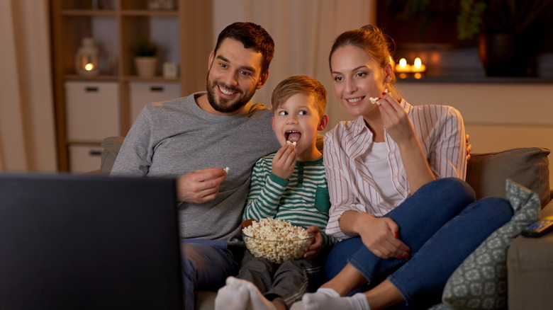 Family eating popcorn 