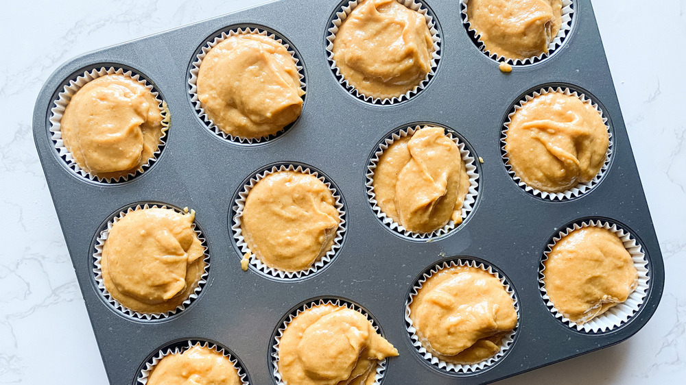 pumpkin muffins in baking tray