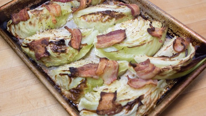 Roasted cabbage topped with bacon