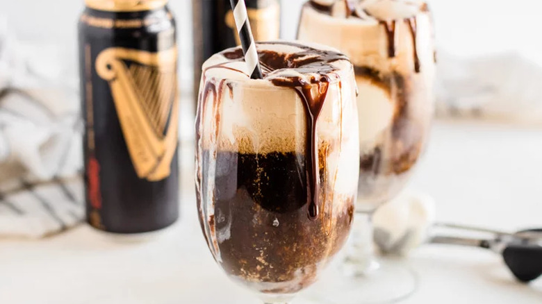 Glasses with dark beer and ice cream float