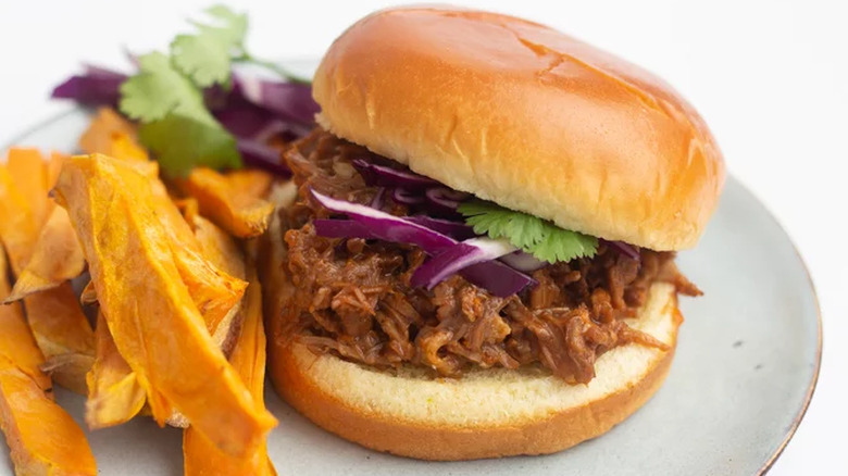 Pulled pork sandwich with fries