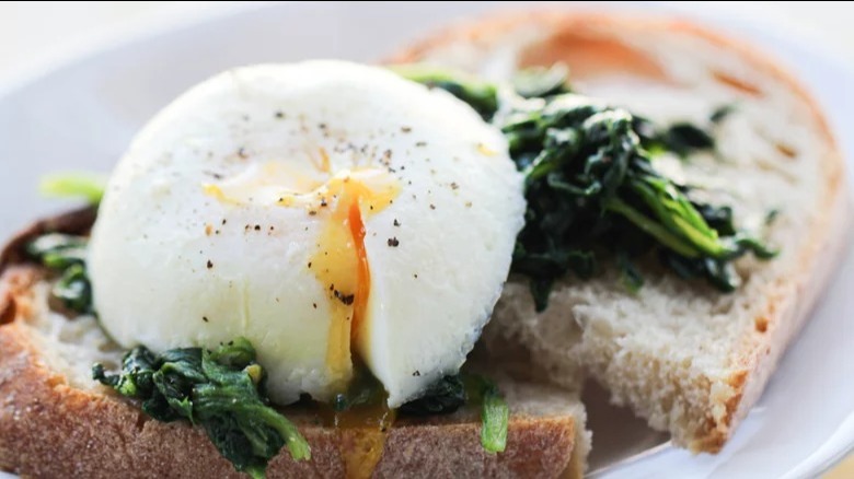 instant pot poached egg with sourdough toast and wilted spinach