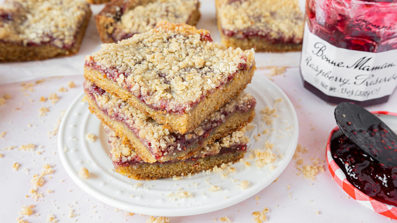 stacked raspberry bars with jam