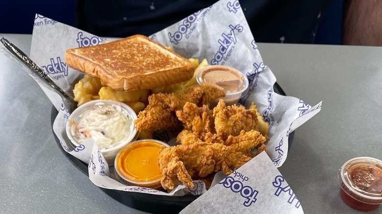 Foosackly's chicken tenders wtith fries, coleslaw, and foo sauce