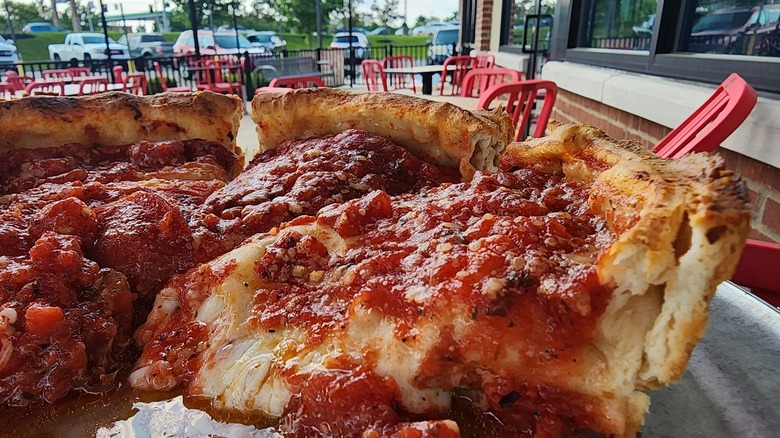 deep dish pizza served on patio