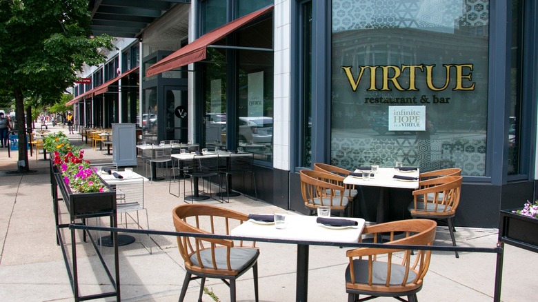 Patio and sign for Virtue restaurant