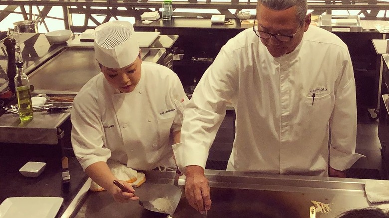 Morimoto and a chef cooking a meal