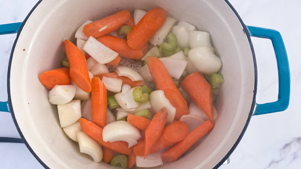 carrots, onions, celery, and garlic in dutch oven