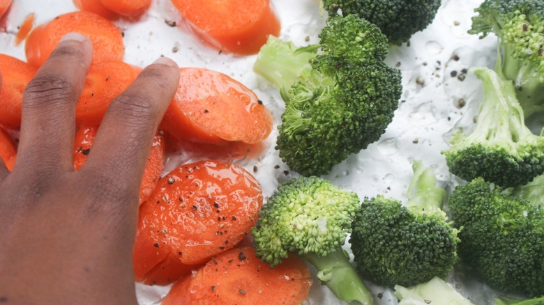 Mixing up the veggies with the marinade