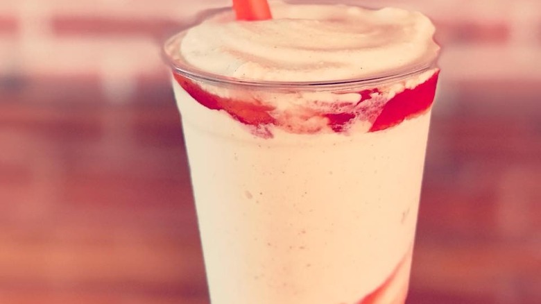 Close up of a strawberry milkshake