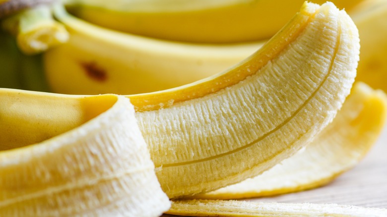 Skin peeled off ripe banana