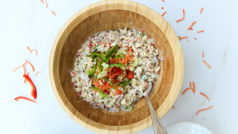 macaroni salad topped with peppers