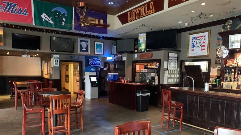 Bar decorated with sports paraphernalia. 