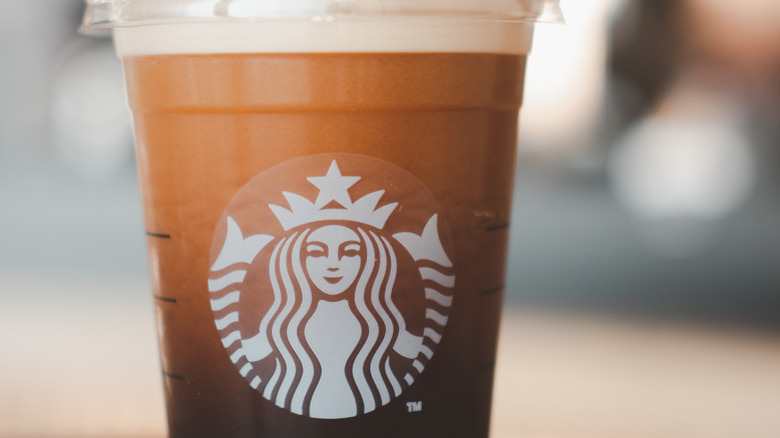 Starbucks cold brew coffee in clear plastic cup