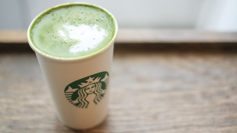 Green matcha latte in Starbucks cup