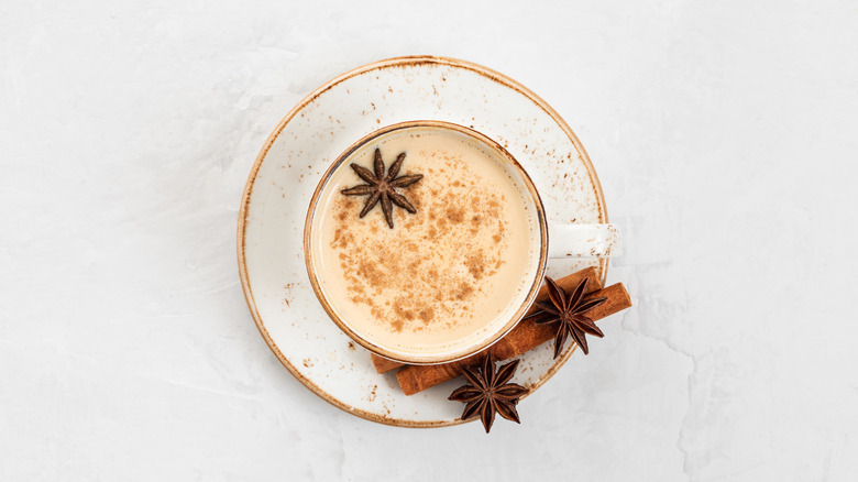 Above shot of chai latte with spices