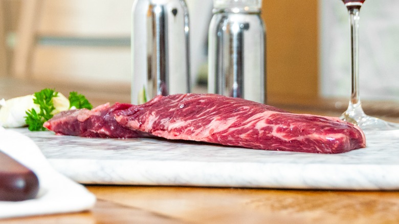 raw hanger steak on table