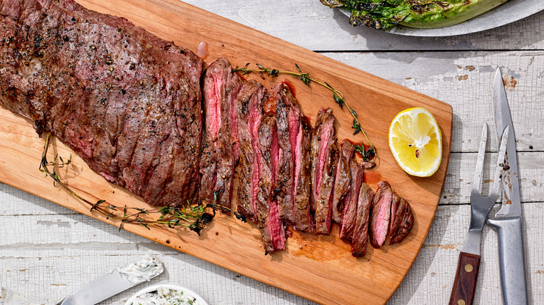 Skirt steak on a cutting bard