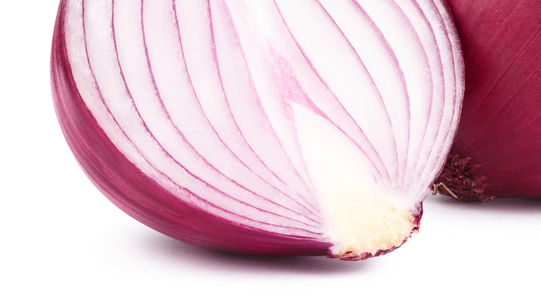 A red onion chopped in half