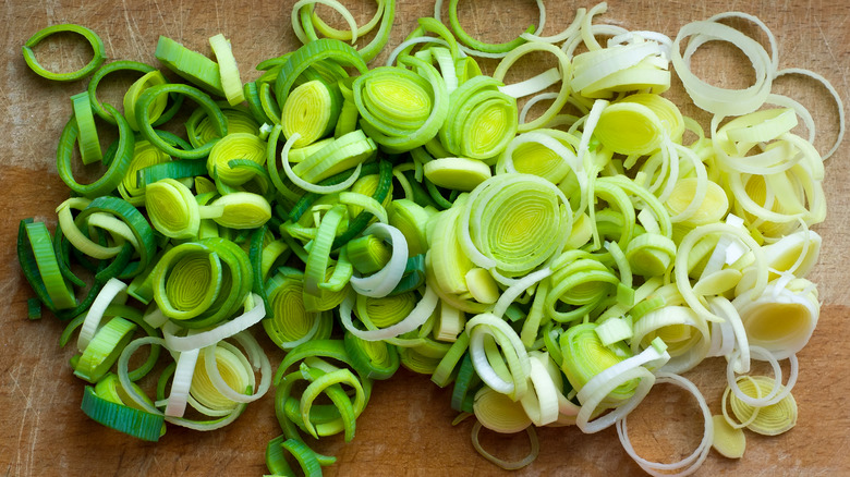 Chopped leeks on wood table