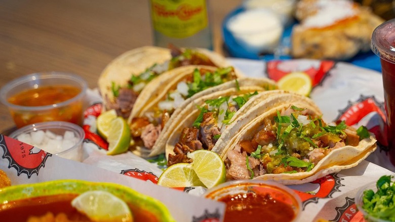 Four carnitas tacos