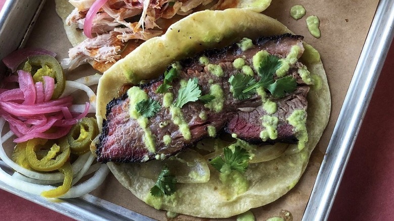 Brisket taco on tray from The Pit Room