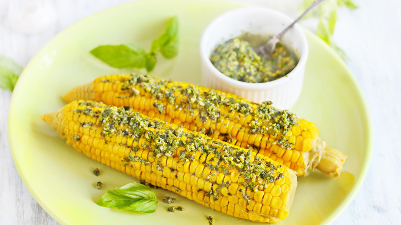 corn on the cob with pesto