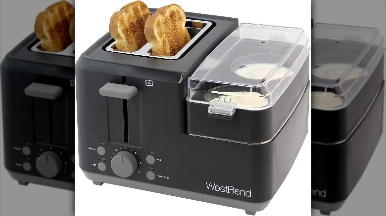 A black West Bend combination toaster on a white background