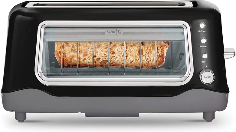 A black Dash toaster on a white background