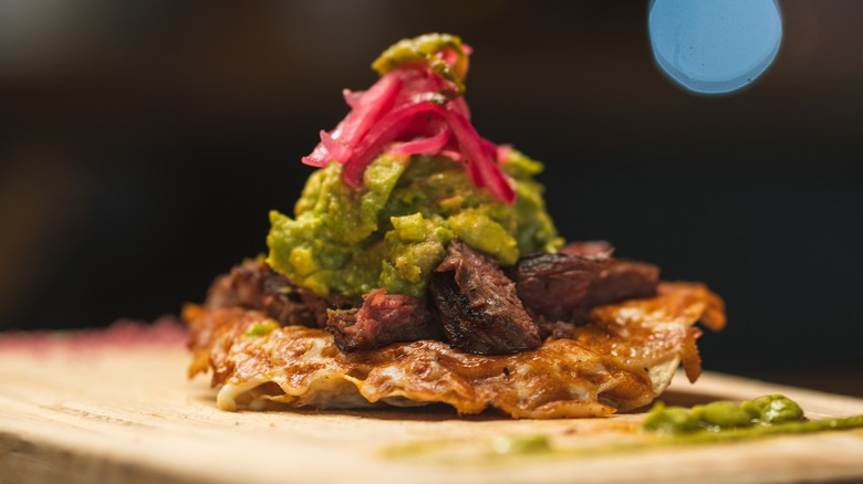 Grilled flank steak with guacamole