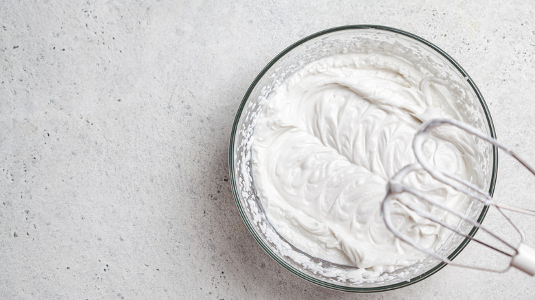 Whipped coconut cream in bowl