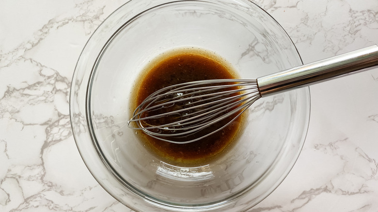 Sauce stirred in a small bowl