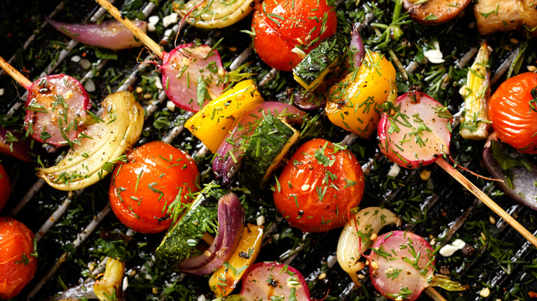 skewered pepper, zucchini, tomato, radish on grill