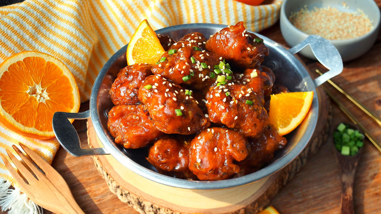 Hot skillet of orange chicken