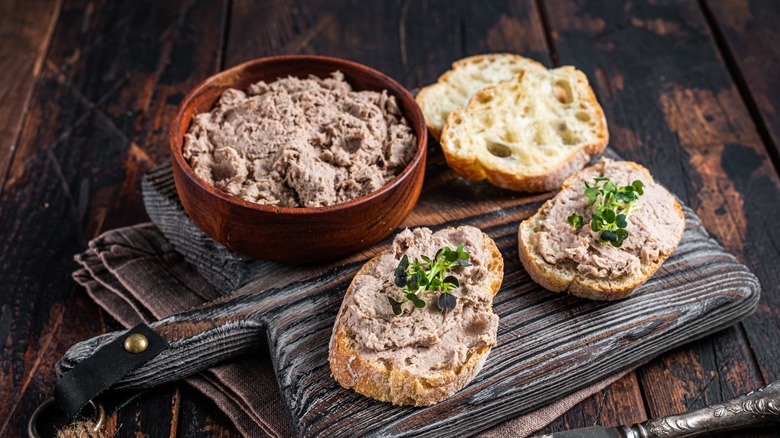 Duck Rillette on a cutting board with bread