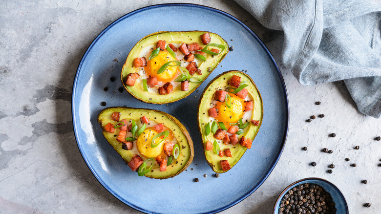 avo egg boat on blue plate