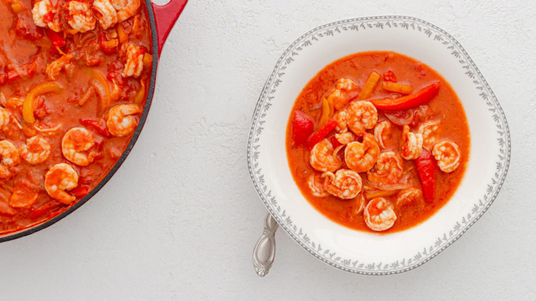 shrimp, peppers, and tomato broth