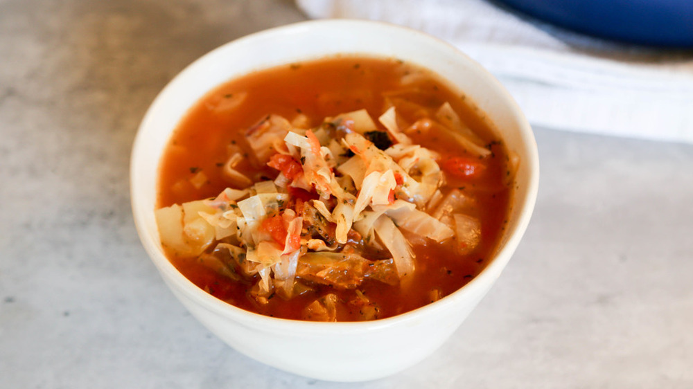 cabbage soup in white bowl