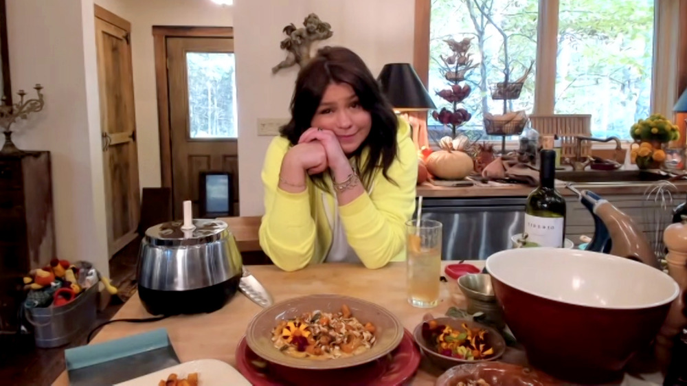 Rachael Ray in a yellow sweatshirt