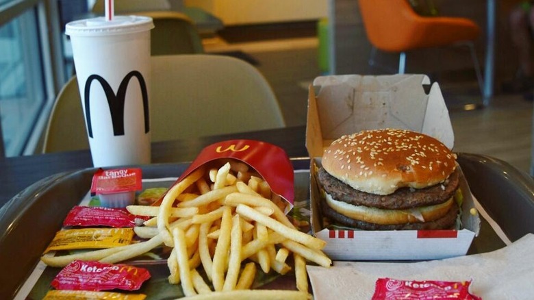 Denali Big Mac on tray next to drink and fries