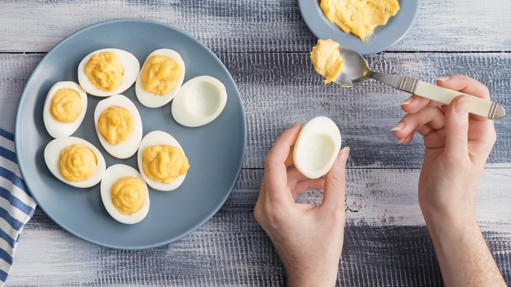 Preparing deviled eggs