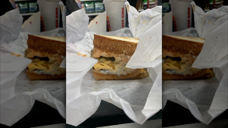 A Whopper Melt from Burger King unwrapped