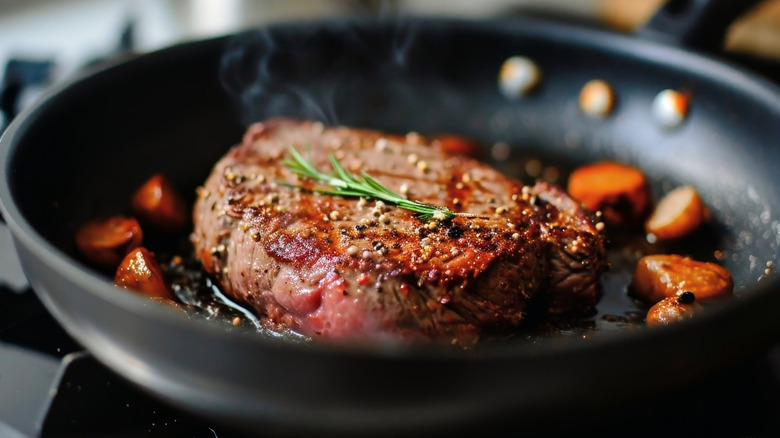 Steak searing in pan