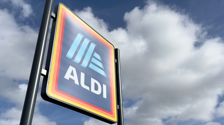 Aldi sign and encroaching clouds