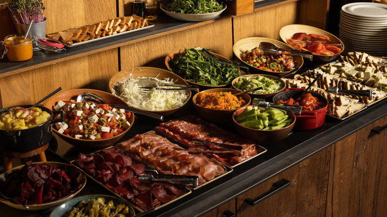 Buffet table laden with food