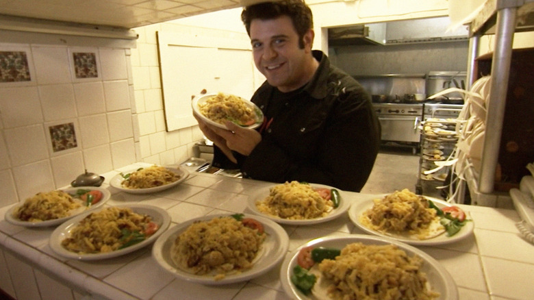 Adam Richman with breakfast tacos