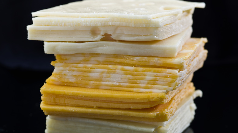 A stack of various cheese slices